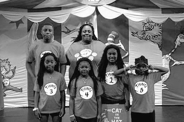 Jerrell Boykins Jr. (top left), a University of Arkansas defensive line target, is shown with his mother (top right) and four siblings when he was 14. Boykins has had to grow up fast after losing his father when he was 5 and his mother when he was 15. “I’ve learned to take care of myself, and I don’t have to depend on anyone if I don’t need to,” he said.
(Photo courtesy of the Boykins family)