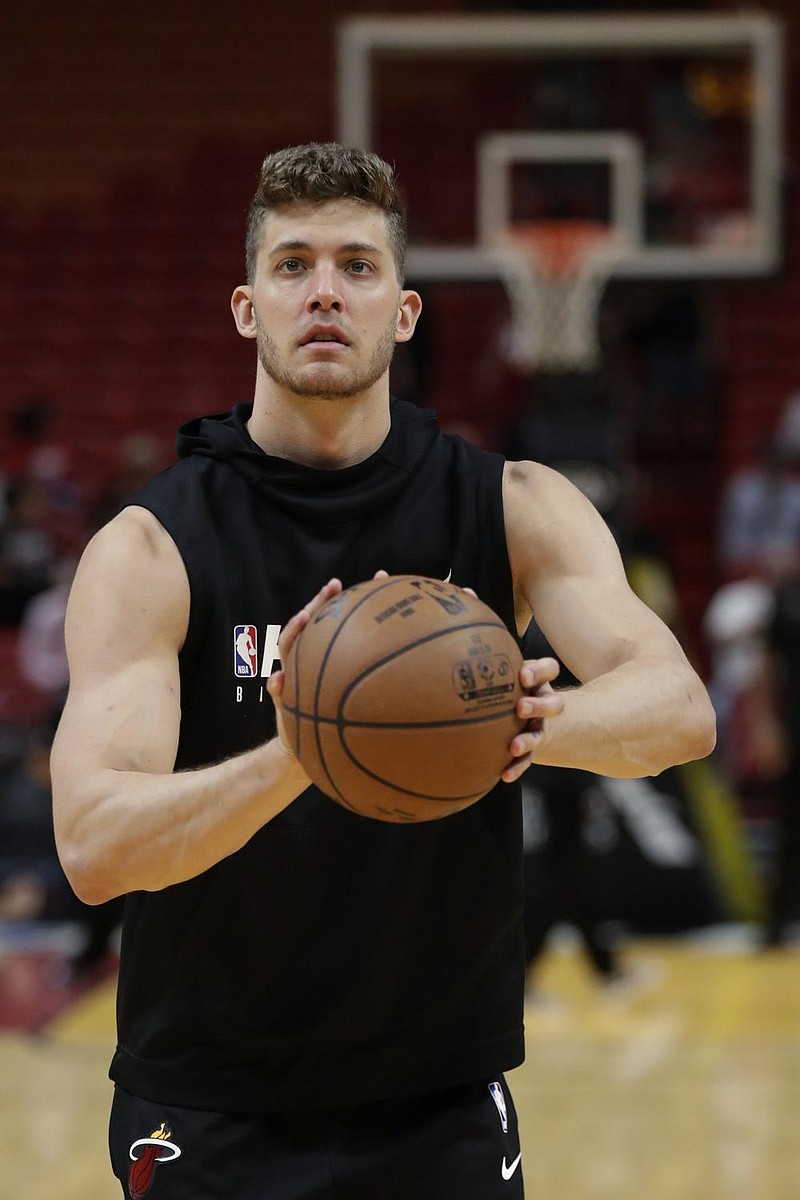 Miami Heat center Meyers Leonard warms up before the start of an NBA basketball game, Wednesday, March 4, 2020, in Miami. (AP Photo/Wilfredo Lee)