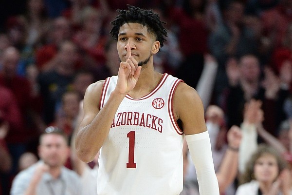 Arkansas guard Isaiah Joe celebrates Friday, Feb. 21, 2020, after hitting a 3-point basket during the second half to seal the Hogs' 78-68 win over Missouri in Bud Walton Arena in Fayetteville.