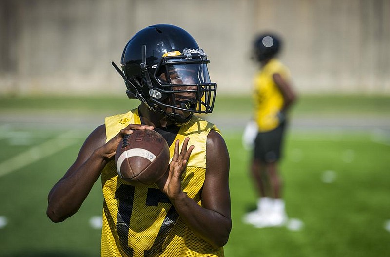 Why Alabama football players are wearing padded helmets in practice 