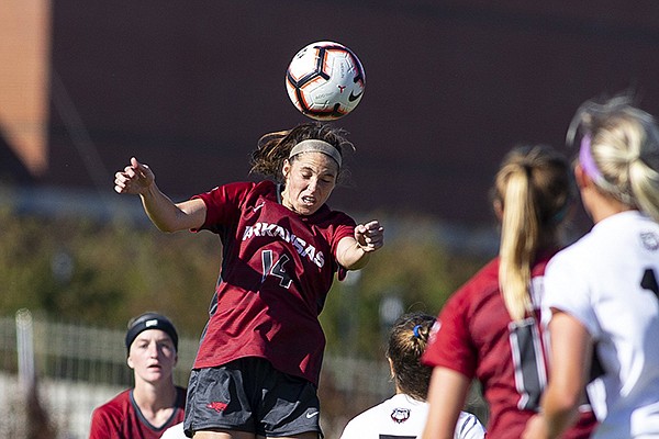 Arkansas forward Taylor Malham heads a ball during a game against Georgia on Sunday, Oct. 27, 2019, in Fayetteville. 
