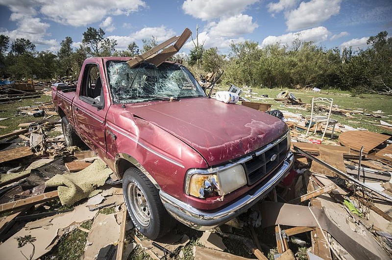 A pickup sits among the rubble Tuesday after a suspected tornado, spawned by Tropical Storm Isaias, hit near Windsor, N.C., early Tuesday. More photos at arkansasonline.com/85storm/. (AP/The News & Observer/Julia Wall) 
