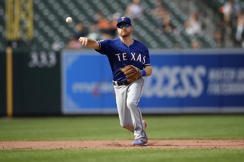 Former Arkansas Razorback Logan For- sythe, shown playing last season for the Texas Rangers, was in the Miami Marlins’ starting lineup Tuesday as their desing- ated hitter. 
(AP le photo) 