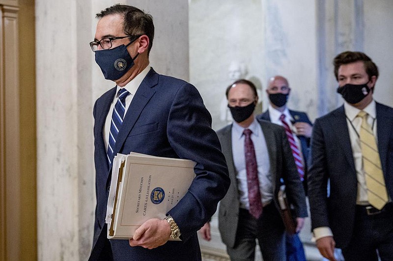 Treasury Secretary Steven Mnuchin (left) leaves a meeting with Senate Majority Leader Mitch McConnell as negotiations continue Tuesday on a coronavirus relief package on Capitol Hill. (AP/Andrew Harnik) 