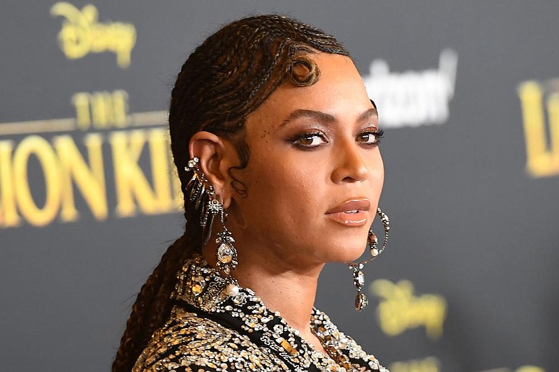 Beyonce arrives for the world premiere of Disney’s “The Lion King” at the Dolby theatre in this 2019 photo. The singer’s new visual album, “Black Is King,” premiered on Disney Plus on Friday.
(AFP/Getty Images/TNS/Robyn Beck)