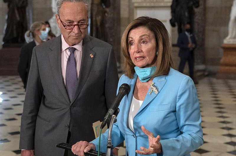 House Speaker Nancy Pelosi (shown with Senate Minority Leader Charles Schumer) said Wednesday that she was optimistic after talks with White House Chief of Staff Mark Meadows and Treasury Secretary Steven Mnuchin.
(AP/Carolyn Kaster)