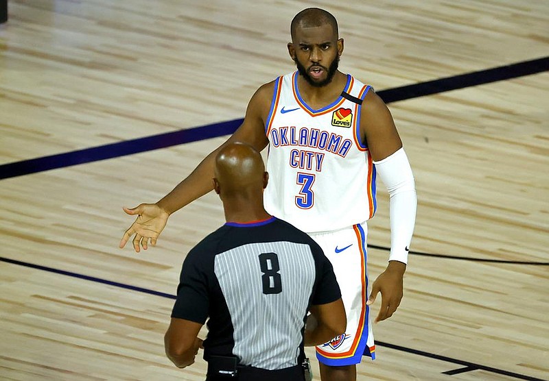 Guard Chris Paul scored 21 points to lead Oklahoma City to a 105-86 victory over the Los Angeles Lakers on Wednesday in Lake Buena Vista, Fla.
(AP/Kevin C. Cox)