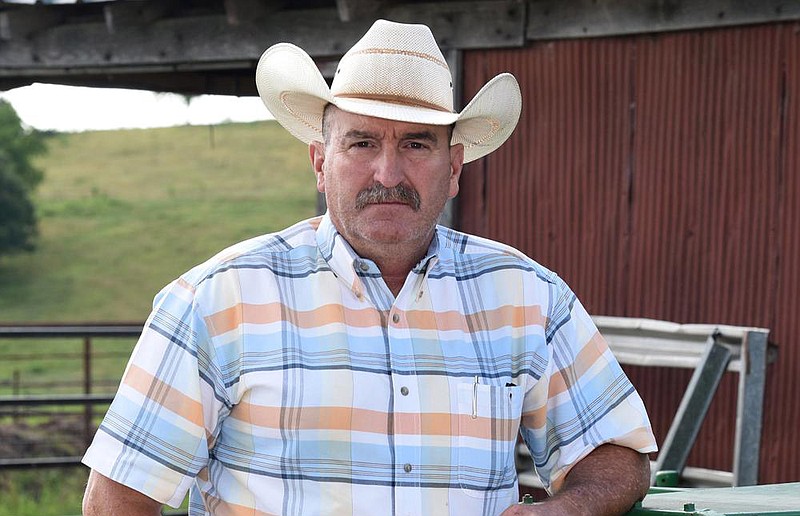 Theron McCammond, shown at his farm in Alpena on July 23, said he has been informed by the county prosecutor that, despite serving as the town’s mayor for a year and a half, he was not mayor because he does not live within the city limits.
(NWA Democrat-Gazette/David Gottschalk)