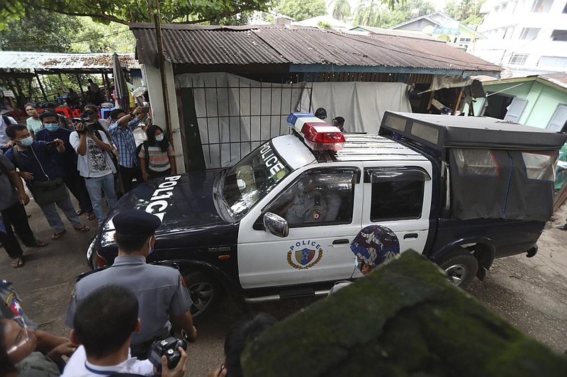 A police vehicle carries Canadian pastor David Lah from court after Thursday’s hearing in Yangon, Burma.
(AP/Thein Zaw)