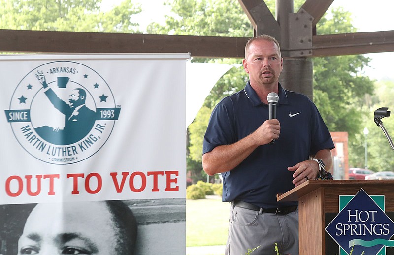 Then incoming Hot Springs Police Chief Chris Chapmond speaks at an Arkansas Martin Luther King, Jr., Commission Get Out to Vote event held June 27 at the Hot Springs Farmers & Artisans Market, about a week before he was formally inducted as the new chief. - Photo by Richard Rasmussen of The Sentinel-Record