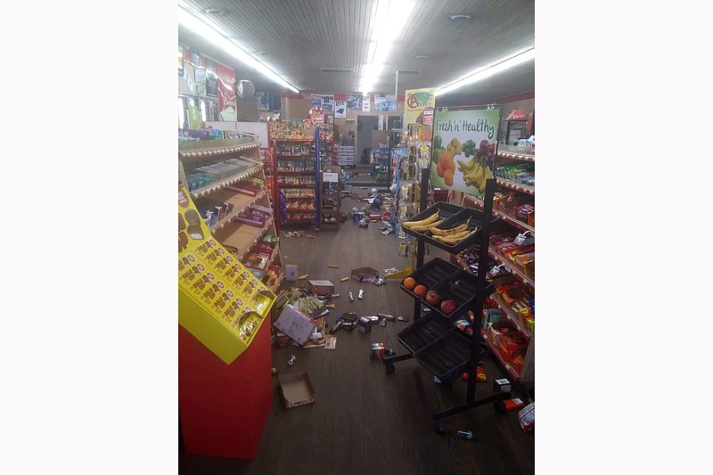 Various items litter the floor of the 4 Brothers Store in Sparta, N.C. after an earthquake shook much of North Carolina early Sunday, Aug. 9, 2020. 