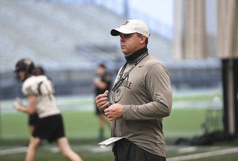 Bentonville Coach Jody Grant was pleased with how the Tigers performed on the first day high school teams could practice in full pads. “I think they were ready to go out and hit something besides a dummy, and I saw some good things out of it,” Grant said.
(NWA Democrat-Gazette/Charlie Kaijo)
