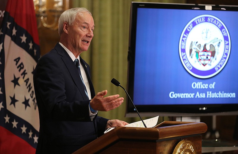 Gov. Asa Hutchinson responds to a question during the daily COVID-19 briefing on Monday, Aug. 10, at the state Capitol in Little Rock. (Arkansas Democrat-Gazette/Thomas Metthe)
