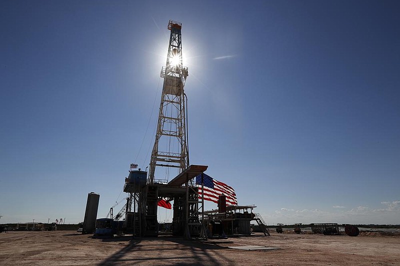 An oil rig stands last month in Midland, Texas. U.S. wholesale prices rose an unexpected 0.6% in July on a big increase in energy prices, the Labor Department said Tuesday. (AP) 