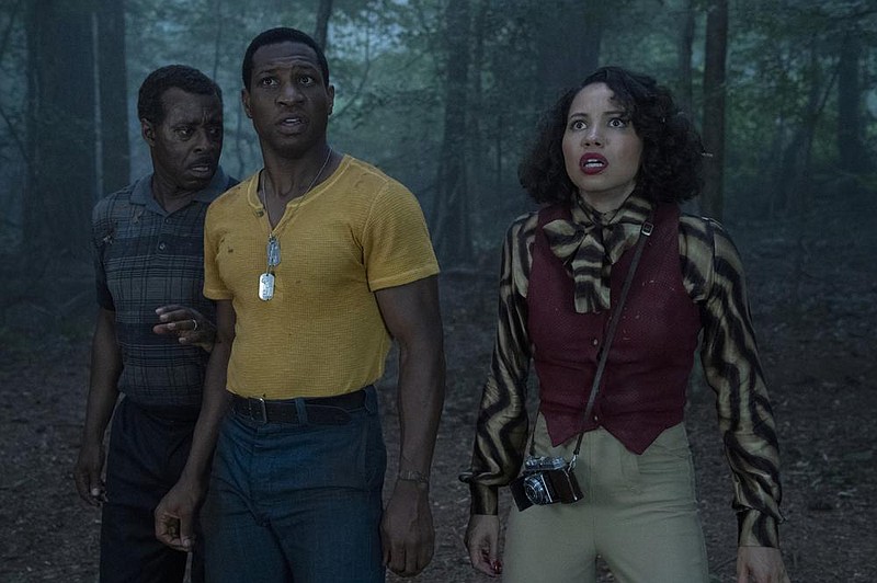 Things are about to get unreal for Courtney B. Vance, Jonathan Majors and Jurnee Smollett in HBO’s “Lovecraft Country.”
(HBO/Eli Joshua Ade)