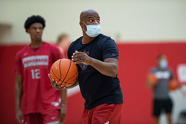 Arkansas assistant basketball coach David Patrick is shown during a July 2020 workout in Fayetteville. 