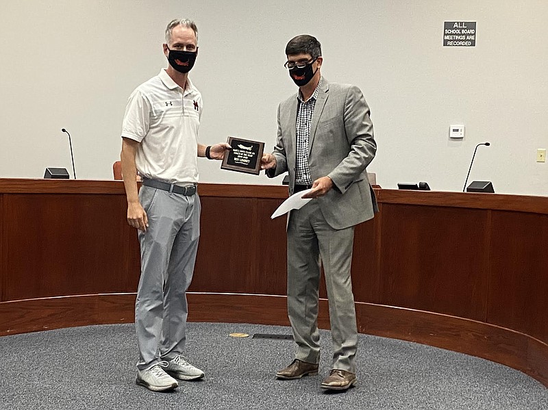 Coaches Kathleen Dingman and Ben Lindsey were recognized during August’s School Board meeting for Coach-of-the-Year awards in their respective sports. Dingman received the 2019-2020 Girls Swimming Coach-of-the-Year award from Arkansas High School Swim Coach Association, and Lindsey was named the 4A Basketball Association Coach-of-the-Year. Superintendent John Ward, who handed the awards to the recipients during the meeting, was nominated to represent the State of Arkansas through the American Association of School Administrators Superintendent of the Year Program.