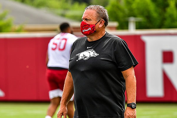 Arkansas football coach Sam Pittman is shown during a July 2020 workout in Fayetteville. 