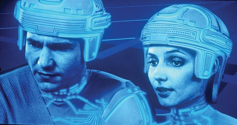 Jeff Bridges and Cindy Morgan star in “TRON,” Disney’s 1982 science-fiction film that was inspired by the early video game Pong.