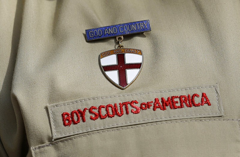 A Boy Scout uniform badge is shown during a news conference in front of the Boy Scouts of America headquarters in Irving, Texas, in this Feb. 4, 2013, file photo.