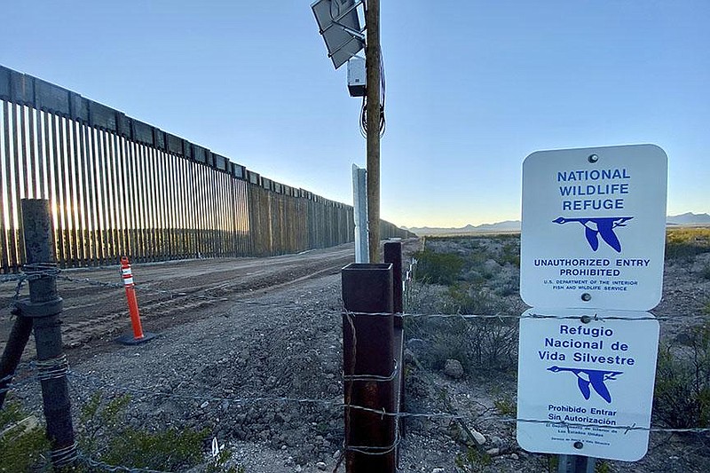 The border wall near the wetlands at the San Bernardino National Wildlife Refuge in southeastern Arizona is shown in this January photo provided by the Center for Biological Diversity. “It’s a pretty magical place,” said Randy Serraglio of the Center for Biological Diversity. “The analogy is an oasis, really. That’s why the water withdrawals are so damaging.” (AP/Center for Biological Diversity/Laiken Jordahl) 