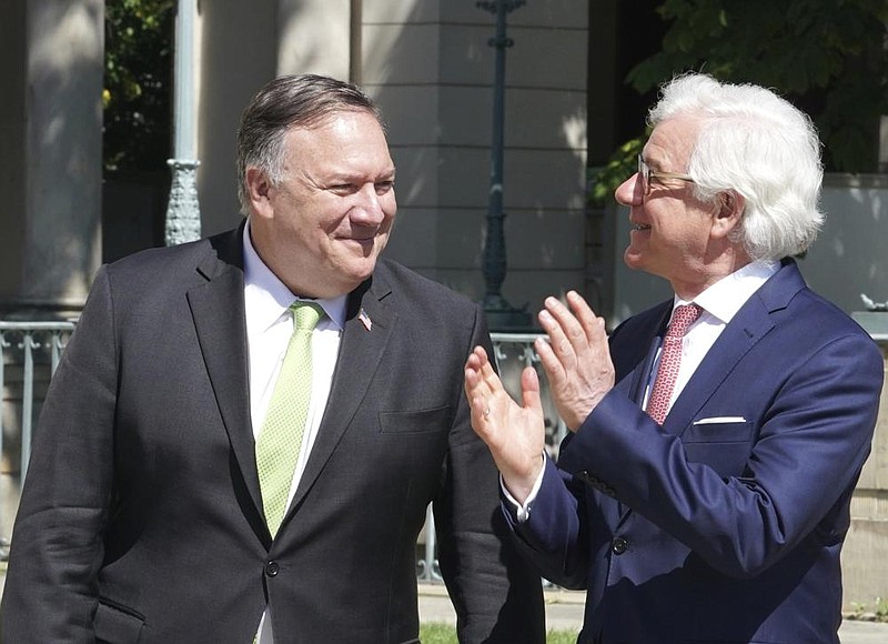 U.S. Secretary of State Mike Pompeo meets Saturday with Po- land’s Foreign Minister Jacek Czaputowicz in Warsaw. (AP/Janek Skarzynski) 
