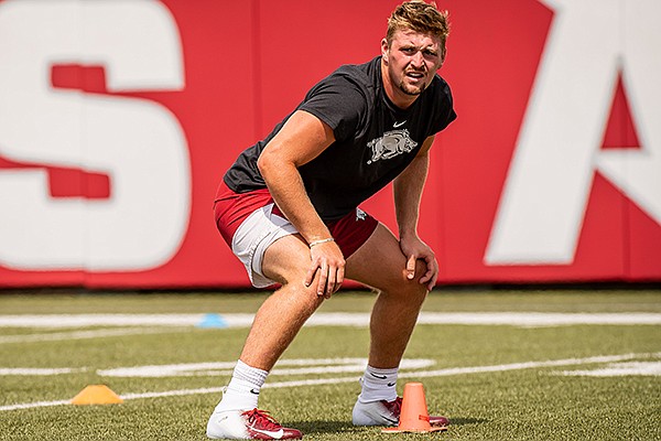 Arkansas linebacker Bumper Pool is shown during a July 2020 workout in Fayetteville. 