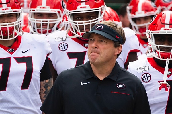 Georgia coach Kirby Smart waits with players to enter the field to take on Georgia Tech Yellow before an NCAA college football game Saturday, Nov. 30, 2019 in Atlanta. (AP Photo/John Amis)