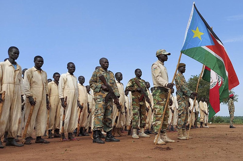 Trainees parade in June as South Sudan’s defense minister visits a military training center in Owiny Ki-Bul. (AP/Maura Ajak) 
