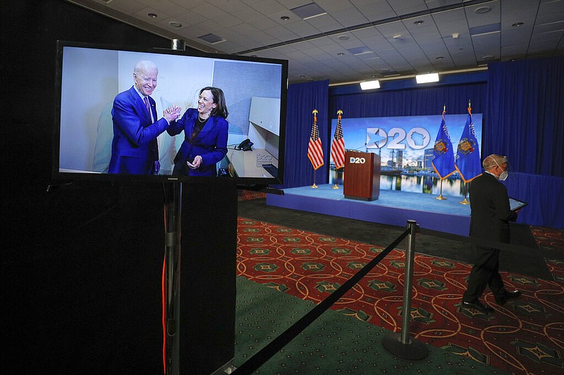 Democratic presidential candidate former Vice President Joe Biden and his running mate Sen. Kamala Harris, D-Calif., appear on a video feed at the start of the second day of the virtual 2020 Democratic National Convention in Milwaukee, Wisc., Tuesday, Aug. 18, 2020. (Brian Snyder/Pool via AP)