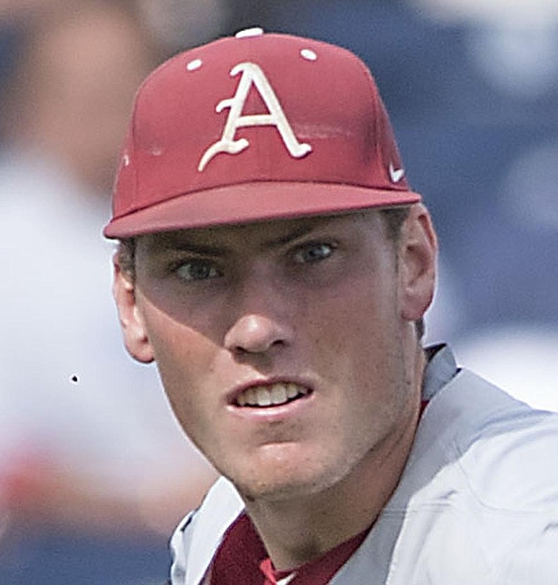 NWA Democrat-Gazette/J.T. WAMPLER -Arkansas' Bobby Wernes looks to make the throw to first base Monday June 15, 2015 during the second round of the 2015 NCAA Menâ€™s College World Series at TD Ameritrade Park Omaha.