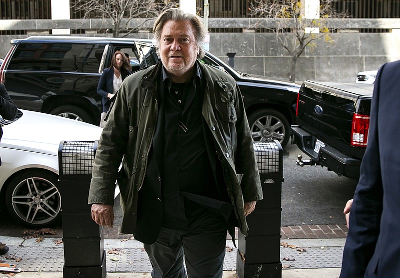 FILE - In this Nov. 8, 2019 file photo, former White House strategist Steve Bannon arrives to testify at the trial of Roger Stone, at federal court in Washington. Bannon was arrested Thursday, Aug. 20, 2020, on charges that he and three others ripped off donors to an online fundraising scheme “We Build The Wall.” The charges were contained in an indictment unsealed in Manhattan federal court. 