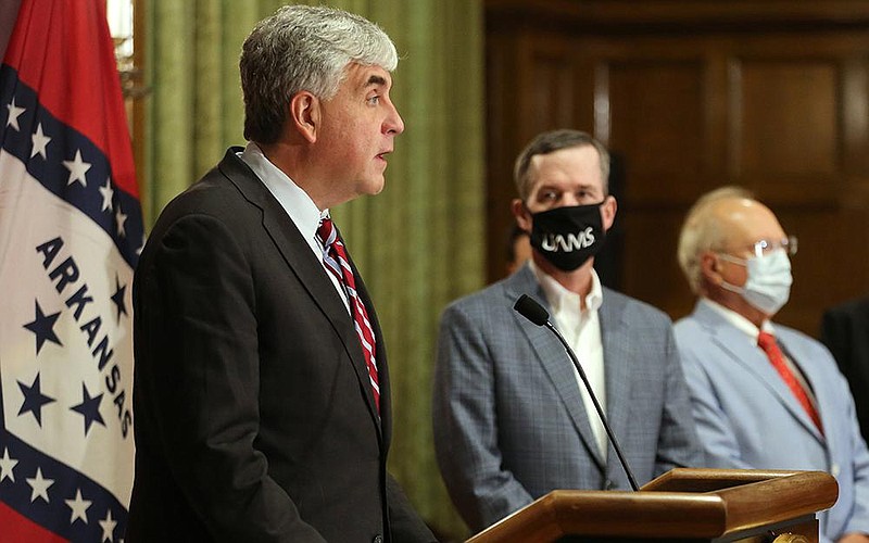 In this file photo Deputy Secretary Eric Hargan (left), with the Department of Health and Human Services, is shown at the state Capitol that Arkansas will receive grants to improve the quality of health in rural communities.
(Arkansas Democrat-Gazette/Thomas Metthe)