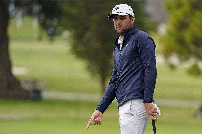 Scottie Scheffler reacts after missing a putt on the sixth hole during the first round of the PGA Championship golf tournament at TPC Harding Park Thursday, Aug. 6, 2020, in San Francisco. (AP Photo/Charlie Riedel)