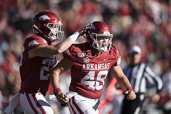Arkansas long snapper Jordan Silver (48) reacts after recovering a fumble during a game against Mississippi State on Saturday, Nov. 2, 2019, in Fayetteville.