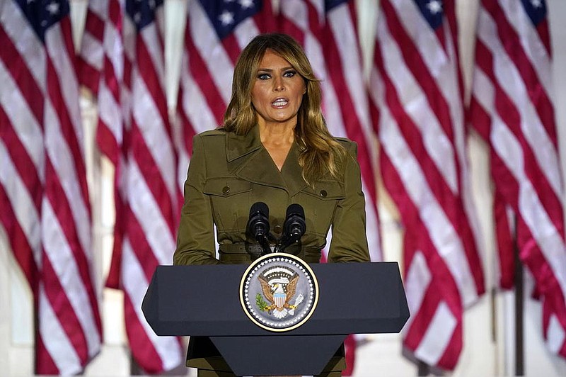 First lady Melania Trump proclaimed Tuesday night that President Donald Trump “will not stop fighting for you and your families.” More photos at arkansasonline.com/826convention/. (AP/Evan Vucci) 