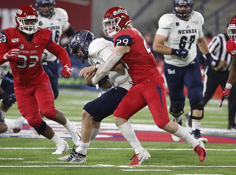 Linebacker Justin Rice (29) started all 12 games for Fresno State last season, leading the Bulldogs with 112 tackles, before trans- ferring to Arkansas State earlier this month. (AP file photo) 