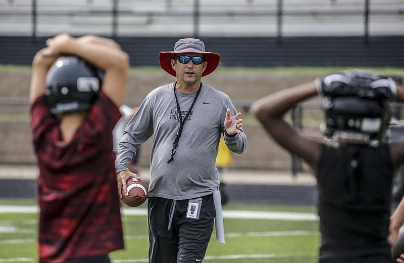 Joe T. Robinson Coach Todd Eskola (center), shown here in 2018, said the decision to move the Senators’ season opener against Pulaski Academy from today to Friday was made as the result of “a very fast-moving situation.”
(Arkansas Democrat-Gazette/John Sykes Jr.)