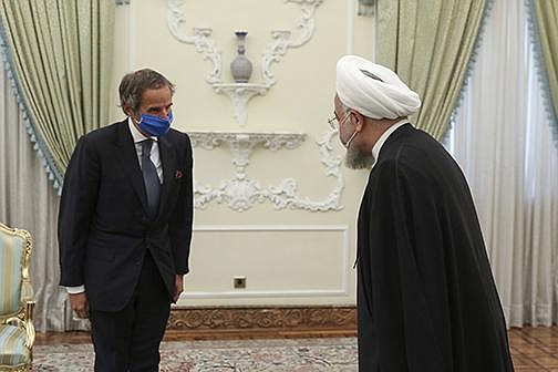 Iranian President Hassan Rouhani (right) welcomes Rafael Grossi, director-general of the International Atomic Energy Agency, at their meeting Wednesday in Tehran.
(AP/Iranian Presidency Office)