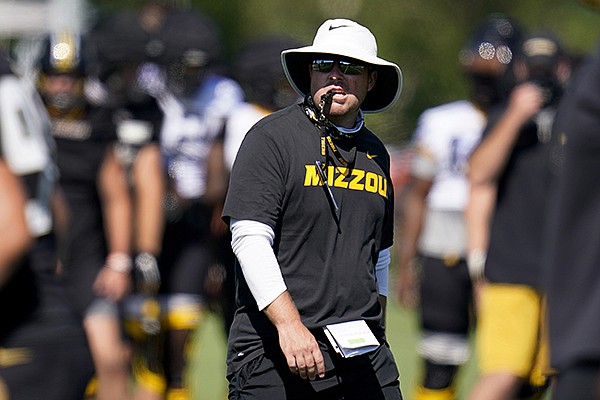 Missouri head coach Eliah Drinkwitz prepares to blow a whistle during an NCAA college football practice Wednesday, Aug. 19, 2020, in Columbia, Mo. (AP Photo/Jeff Roberson)


