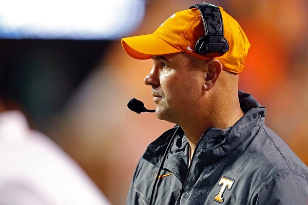 Tennessee head coach Jeremy Pruitt watches the first half of an NCAA college football game against Vanderbilt, Saturday, Nov. 30, 2019, in Knoxville, Tenn. (AP Photo/Wade Payne)