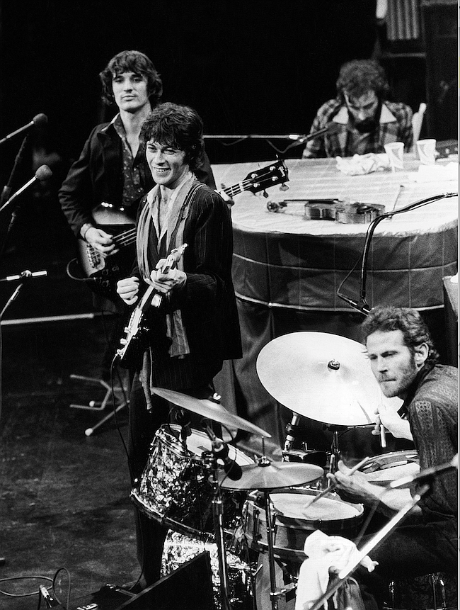 The Band (from top right, clockwise): Richard Manuel on piano, Levon Helm on drums, lead guitarist Robbie Robertson and bass guitarist Rick Danko, take the stage for their final live performance at Winterland Auditorium in San Francisco on Nov. 27, 1976.(AP file photo)