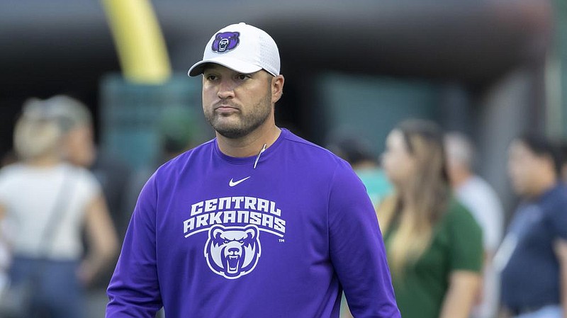 In this Sept. 21, 2019, file photo, Central Arkansas head coach Nathan Brown walks on to the field before the start of an NCAA college football game against Hawaii in Honolulu. 
 (AP Photo/Eugene Tanner, File)