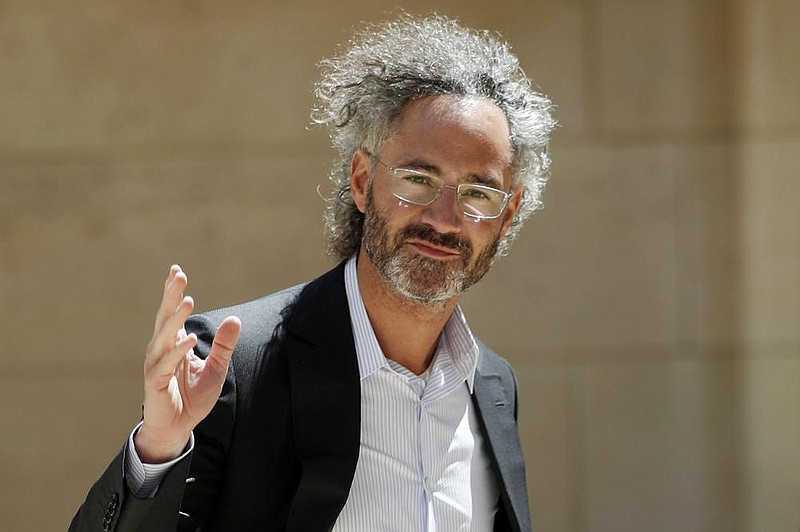 Palantir CEO Alex Karp arrives for the Tech for Good summit in Paris in 2019. Palantir stands to cause a bit of confusion on Wall Street when it goes public. (AP/Thibault Camus) 