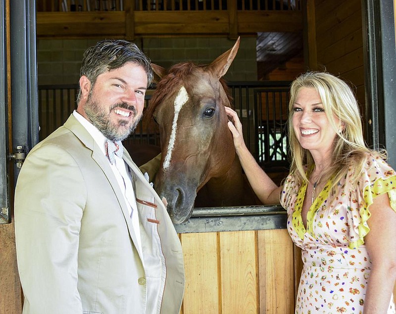 Dylan and Angie Potts are co-chairing this year’s Southern Silks soiree for Methodist Family Health. The annual event coincides with the finish of the Kentucky Derby, which was moved from May to Sept. 5 because of the covid-19 pandemic. (Arkansas Democrat-Gazette/Cary Jenkins) 