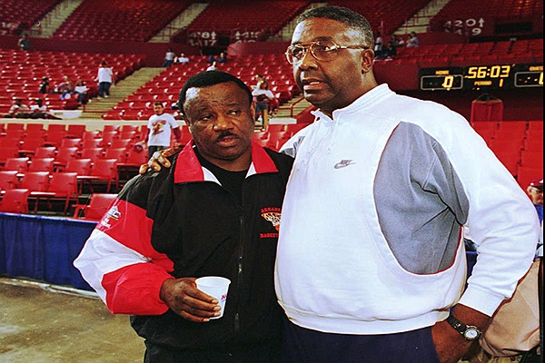 Arkansas coach Nolan Richardson (left) and Georgetown coach John Thompson are shown prior to practice Thursday, March 17, 1994, at Myriad Arena in Oklahoma City. The Razorbacks defeated the Hoyas 85-73 three days later in the second round of the NCAA Tournament. 