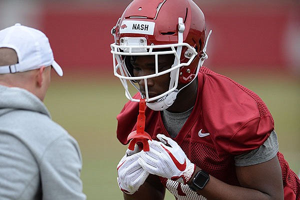 Arkansas receiver Shamar Nash takes part in a drill Friday, March 1, 2019, during practice at the university practice facility in Fayetteville.