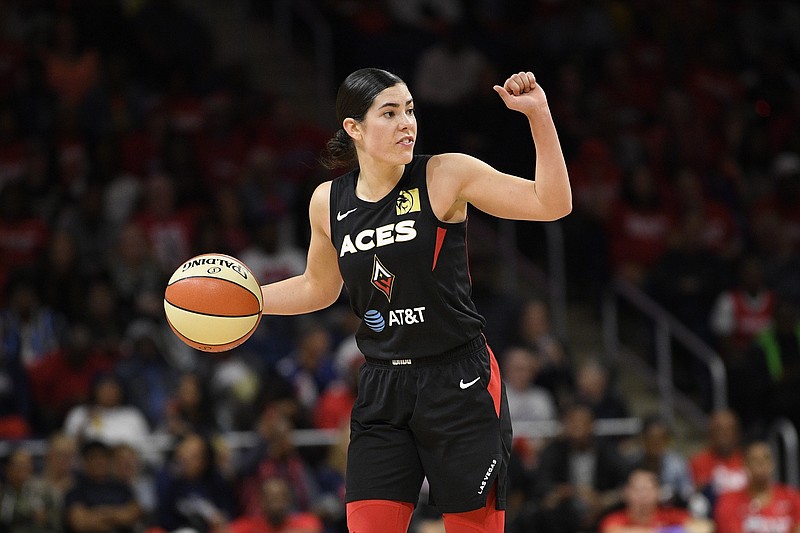Las Vegas Aces guard Kelsey Plum dribbles the ball against the Washington Mystics during the second half of Game 2 of a WNBA playoff basketball series, Thursday, Sept. 19, 2019, in Washington. The Mystics won 103-91. (AP Photo/Nick Wass)


