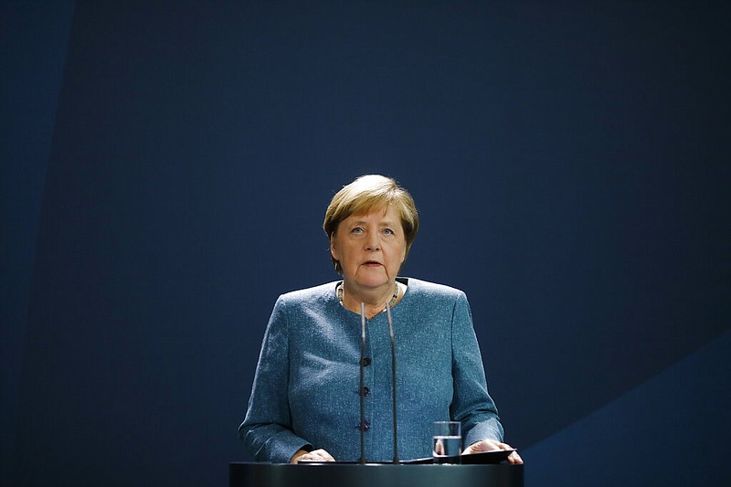 German Chancellor Angela Merkel speaks to media during a statement about latest developments in the case of Russian opposition leader Alexei Navalny at the chancellery in Berlin, Germany, Wednesday, Sept. 2, 2020. Russian opposition leader Alexei Navalny was the victim of an attack and poisoned with the Soviet-era nerve agent Novichok, the German government said Wednesday, Sept. 2, 2020 citing new test results. (AP Photo/Markus Schreiber, Pool)      