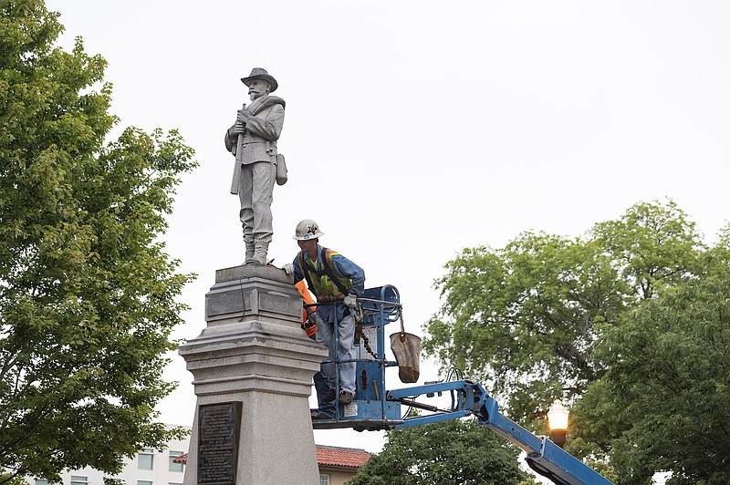 Crews remove the confederate statue on the Bentonville Square Wednesday, Sept. 2, 2020 in Bentonville. (NWA Democrat-Gazette/SPENCER TIREY) 
